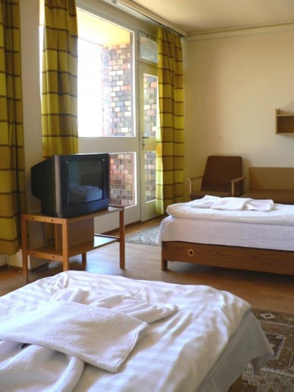 Hotel Napfeny Balatonlelle Szoba fotó